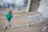 Running from the rain   In Porthcawl Beach